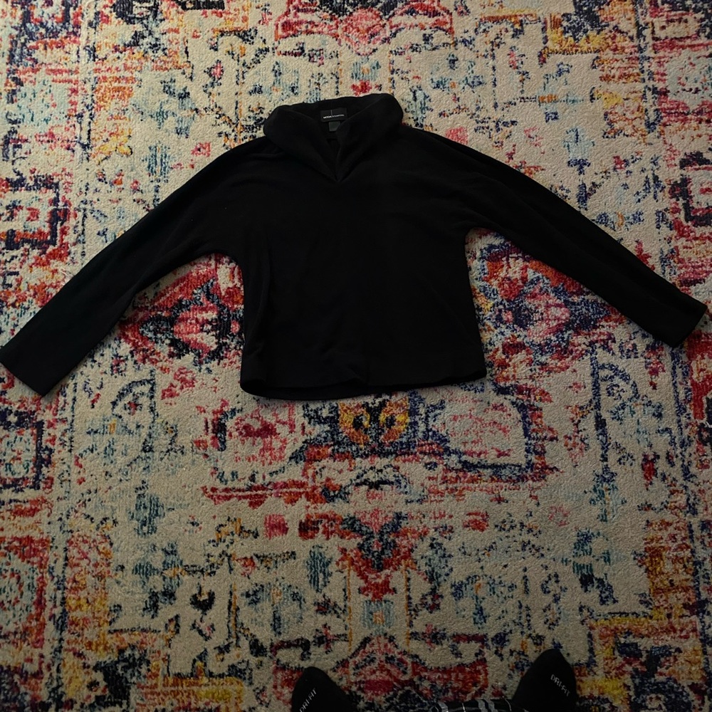 Black sweater with collar and seam in the middle
